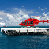 Superyacht reef + helicopter — Cairns