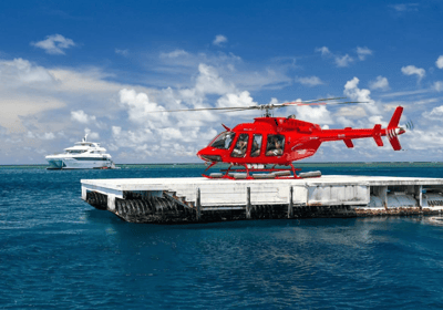 Superyacht reef + helicopter — Cairns