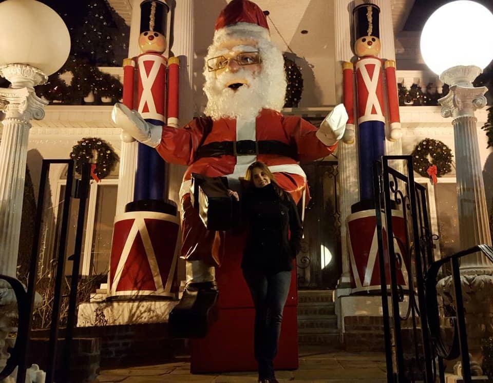 Large Santa between two nutcrackers at a front door