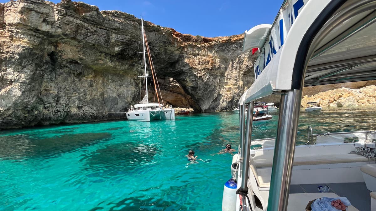 Rocky Comino coastline with turquoise water