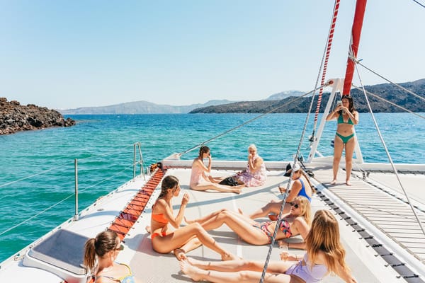 GetYourGuide: Santorini: Catamaran Tour with BBQ Dinner, Drinks, and Music