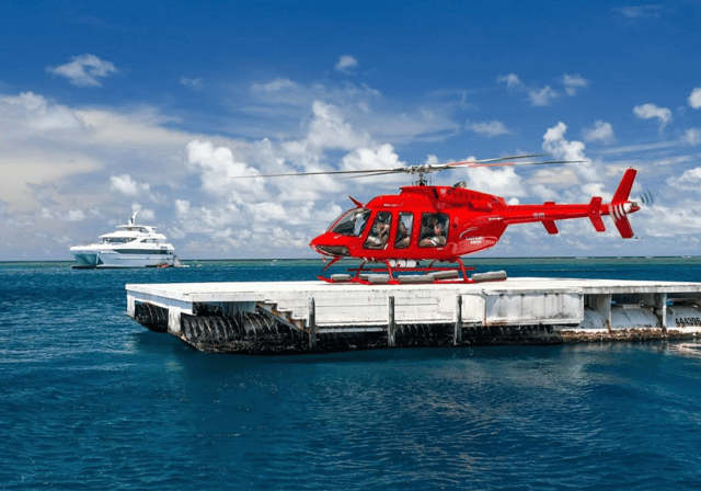 Superyacht reef + helicopter — Cairns