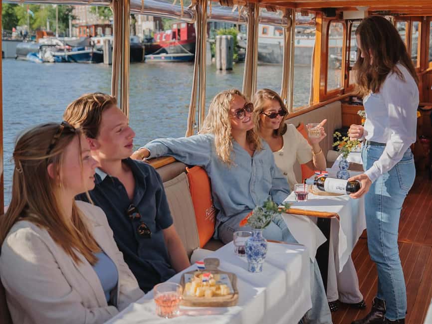 Immagine nº 4 di Amsterdam: Crociera in barca classica con formaggio e vino opzionali attività a Amsterdam, caricata dal fornitore