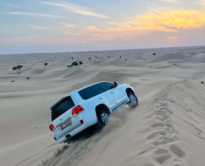 image n.1 of Abu Dhabi: Stopover Desert Tour, Camel Ride & Sandboarding activity in Abu Dhabi, uploaded by supplier