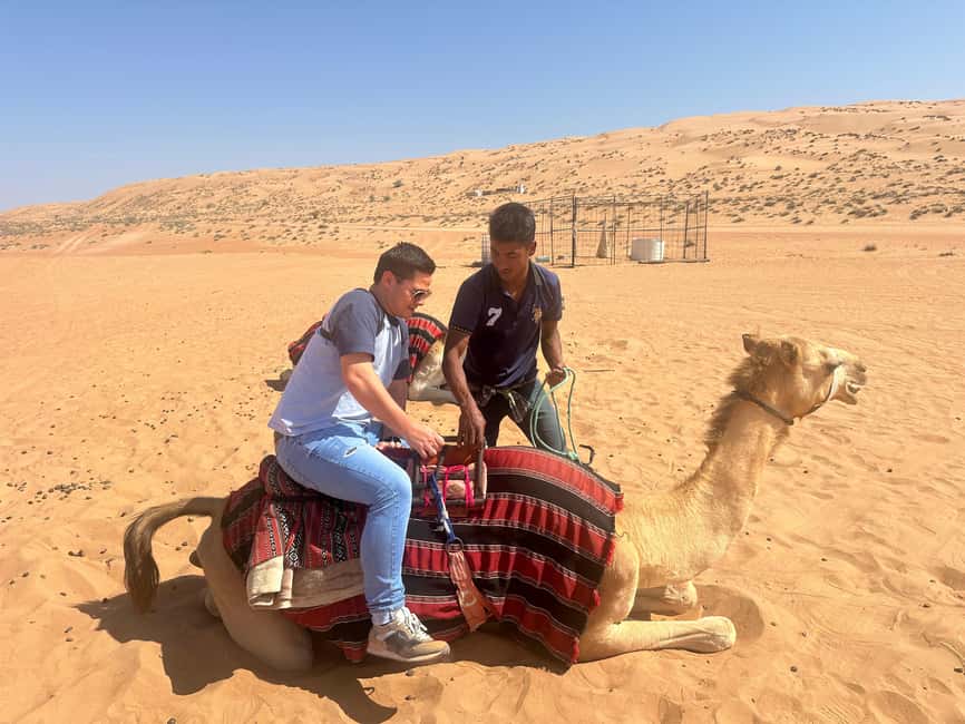 Immagine nº 12 di Muscat: giro in cammello al tramonto nel deserto di Bidiya con trasferimento attività a Regione al-Sharqiyya, caricata dal fornitore