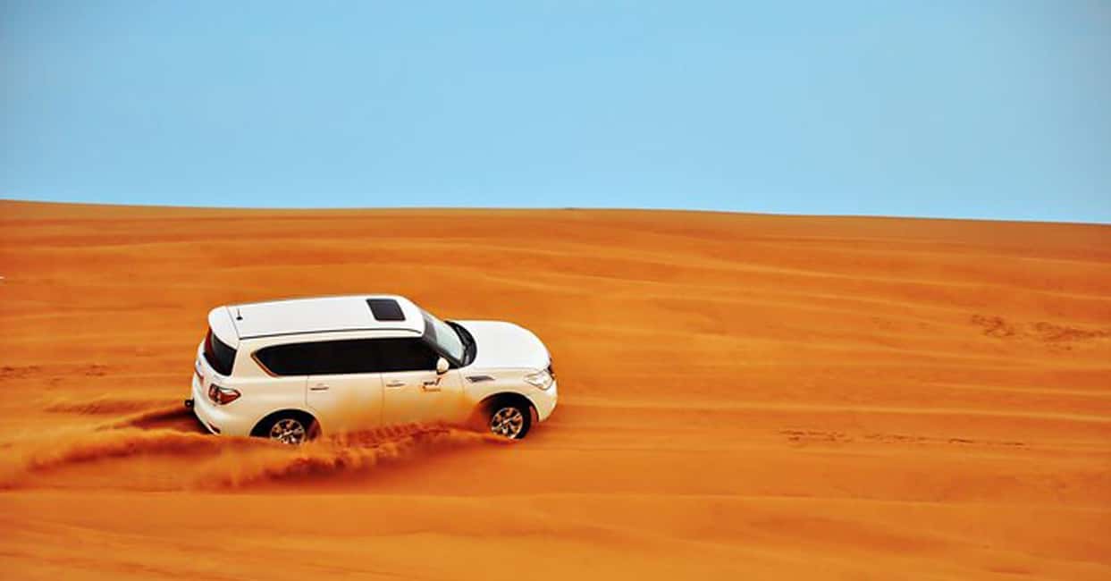 Immagine nº 1 di Safari nel deserto con cena VIP-BBQ e quad bike opzionale attività a Mascate, caricata dal fornitore