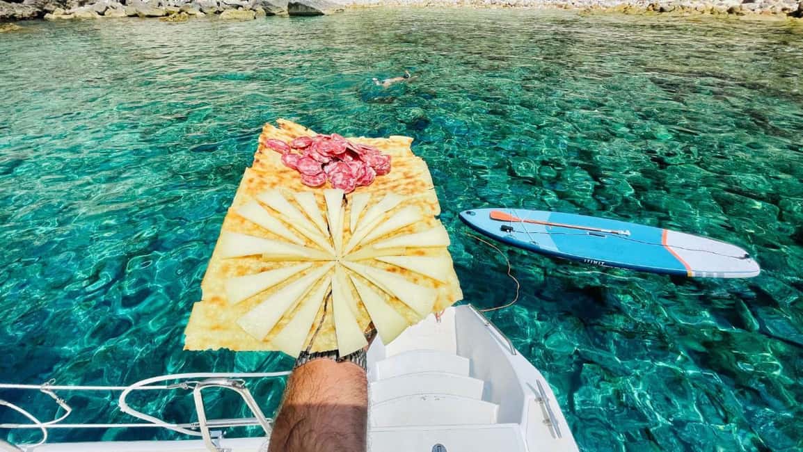 image n.4 of Alghero: Full day on a catamaran in Porto Conte Natural Park activity in Alghero, uploaded by supplier