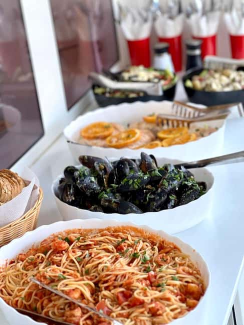 Immagine nº 9 di Catamarano di lusso Panormo: pranzo gourmet, calette nascoste e nuotate attività a Panormos in Rethymno, caricata dal fornitore