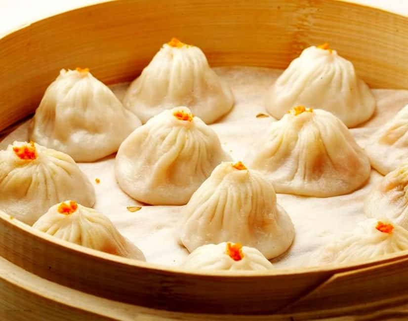 Image N°7 de Croisière nocturne sur le fleuve Shanghai : siège VIP et dîner authentique activité à Shanghaï, publiée par le prestataire