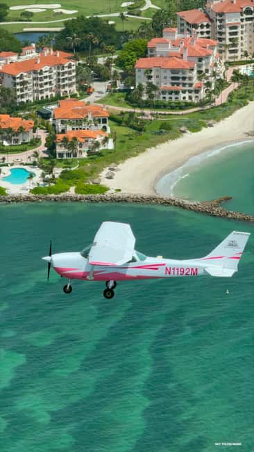 image n.5 of Miami Beach: South Beach Private Airplane Tour with Drinks activity in Miami, uploaded by supplier