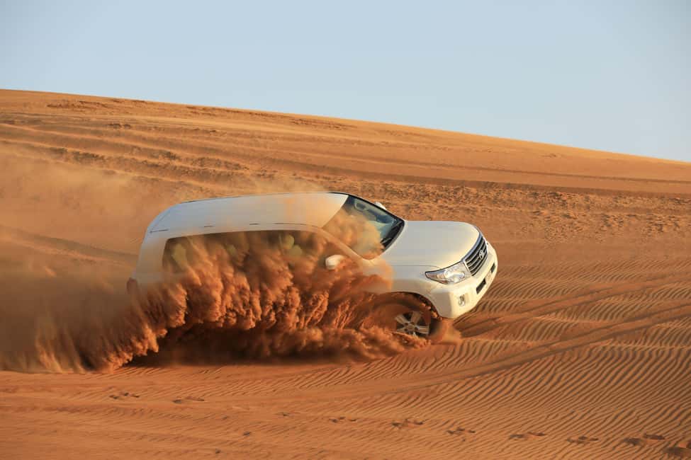 afbeelding n.5 van Dubai: Woestijnsafari, quad, sandboarden, kamelen & BBQ activiteit in Dubai, geüpload door aanbieder