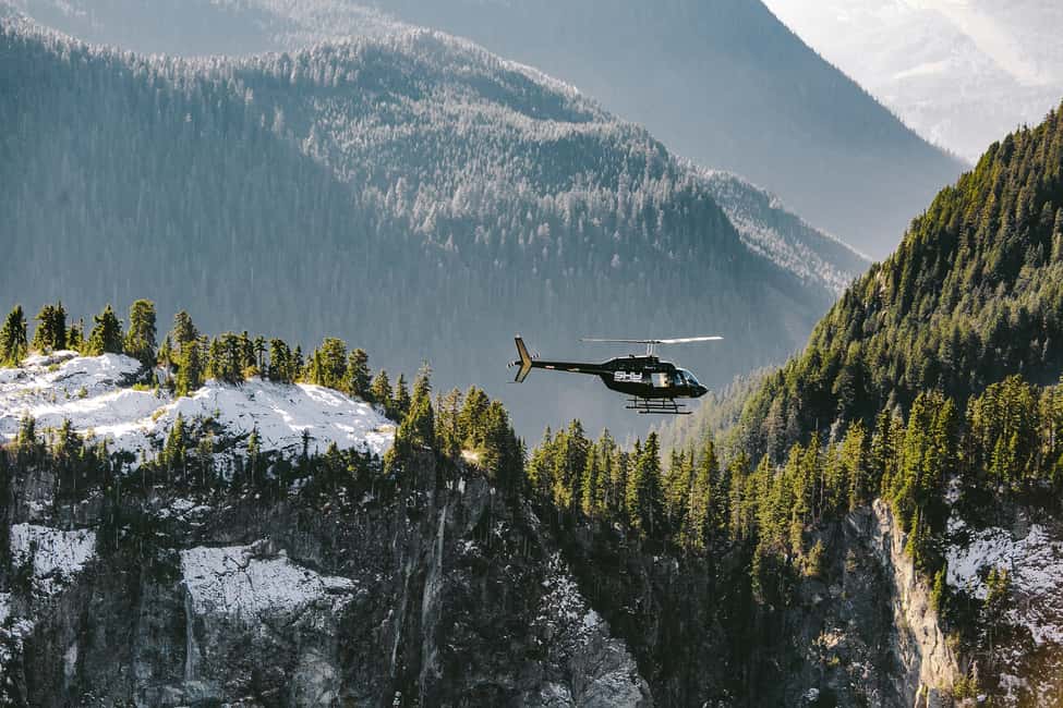 image n.1 of Vancouver: Coastal Mountain Landing Helicopter Tour activity in British Columbia, uploaded by supplier