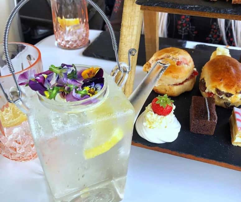 image n.4 of Edinburgh: Vintage Bus Tour with Afternoon Tea or Gin activity in Edinburgh, uploaded by supplier