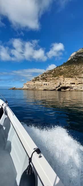 imagem n.14 de Sesimbra: Passeio de barco pelas baías e praias secretas com snorkeling atividade em Distrito de Lisboa, carregada pelo fornecedor