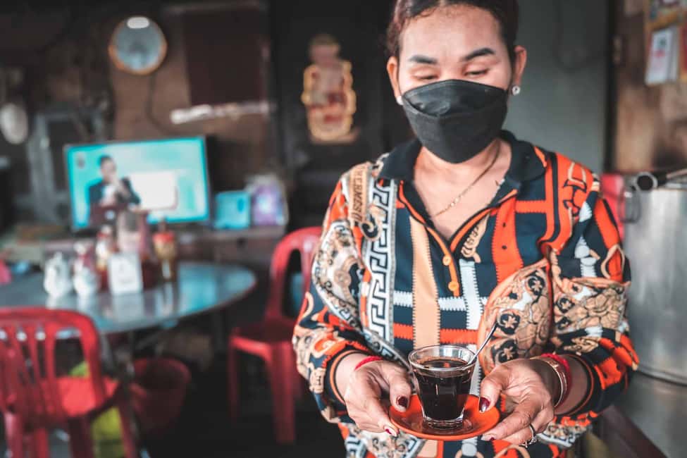 imagem n.4 de Phnom Penh: mercado matinal e café da manhã guiado por Tuktuk atividade em Phnom Penh, carregada pelo fornecedor