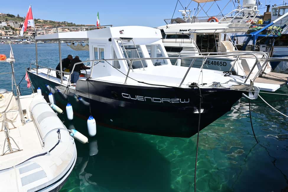 image n.3 of Catania: Boat Tour and Snorkeling with Aperitif and Prosecco activity in Acireale, uploaded by supplier