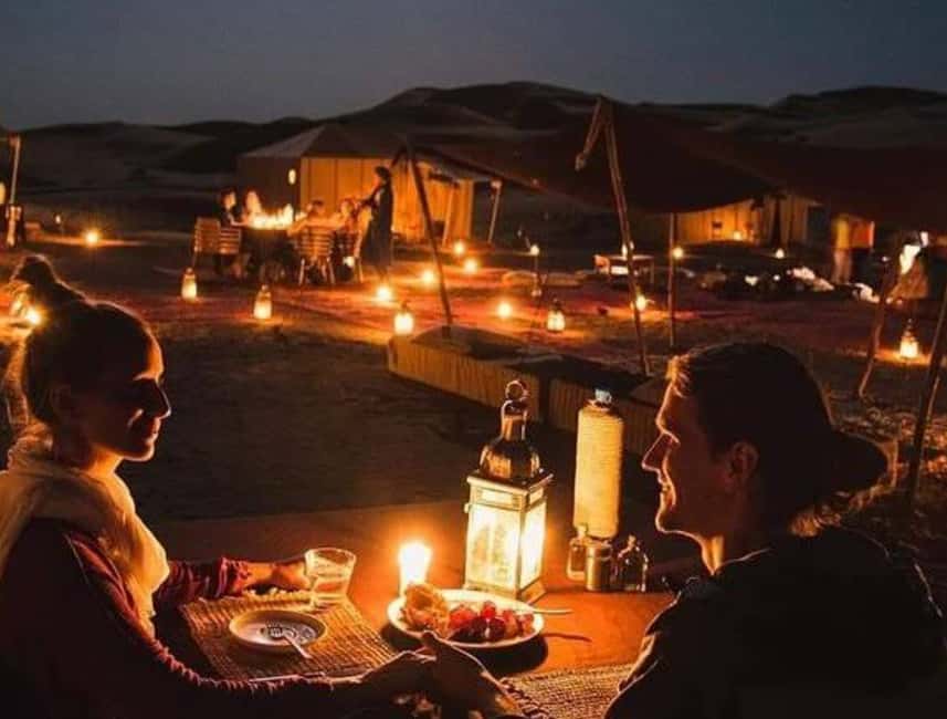 Immagine nº 1 di Marrakesh: Tramonto nel deserto di Agafay, giro in cammello e cena con spettacolo attività a Marrakech, caricata dal fornitore