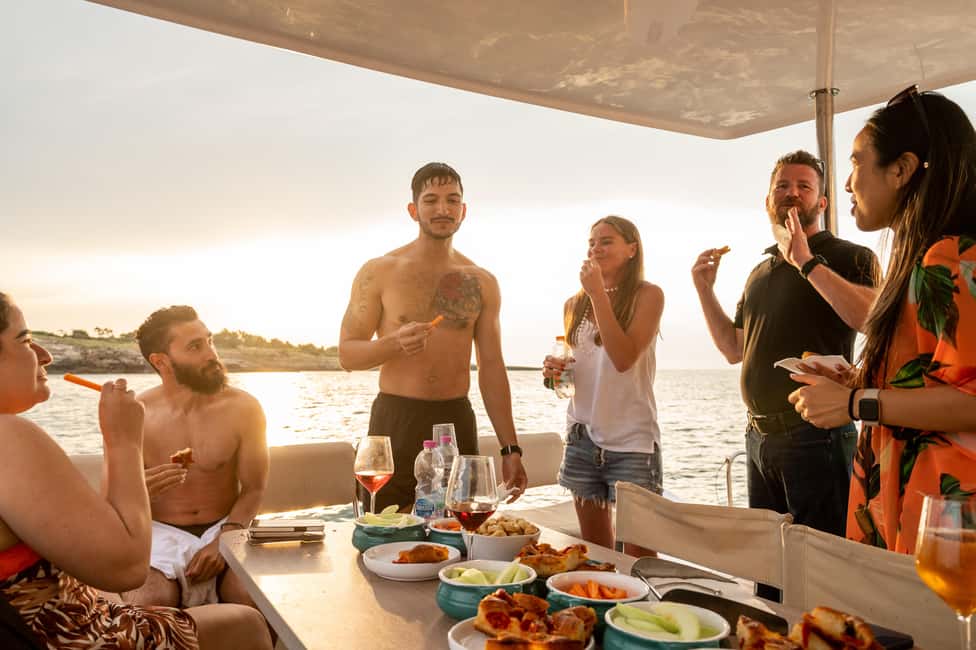image n.2 of Polignano a Mare: Catamaran Tour with Aperitif & Local Food activity in Polignano a Mare, uploaded by supplier