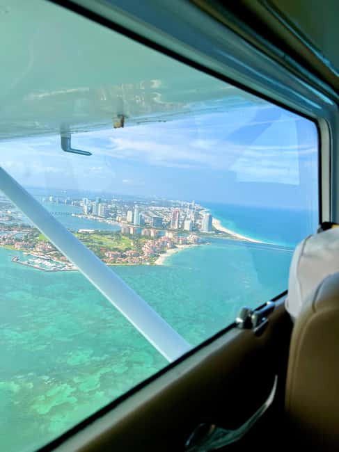 image n.13 of Miami Beach: South Beach Private Airplane Tour with Drinks activity in Miami, uploaded by supplier