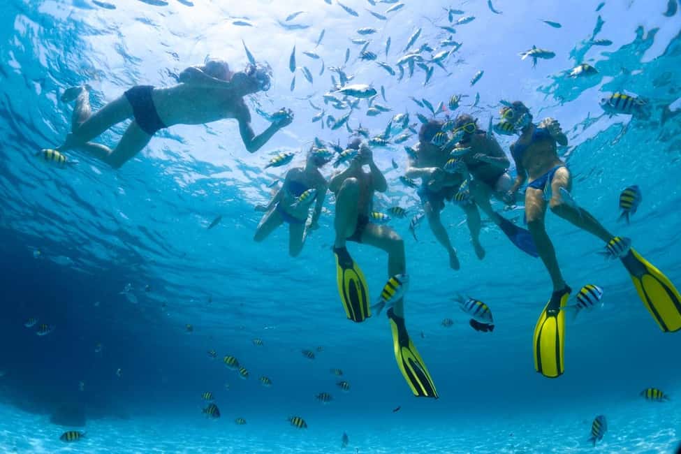 Immagine nº 3 di Hurghada: Escursione di un giorno a Orange Bay con sport acquatici e pranzo attività a Governatorato del Mar Rosso, caricata dal fornitore