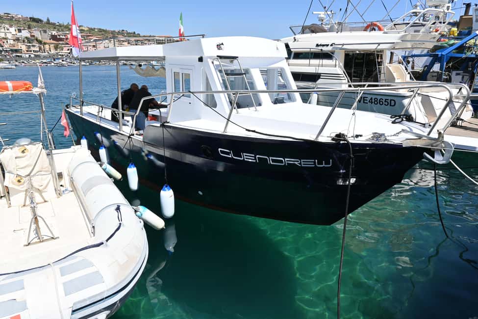 image n.9 of Catania: Boat Tour and Snorkeling with Aperitif and Prosecco activity in Acireale, uploaded by supplier