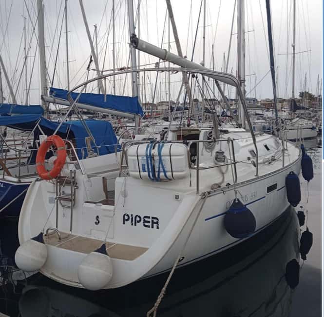 imagen n.º 3 de Catania: Excursión en barco con aperitivo, Prosecco y snorkel actividad en Catania, subida por el proveedor