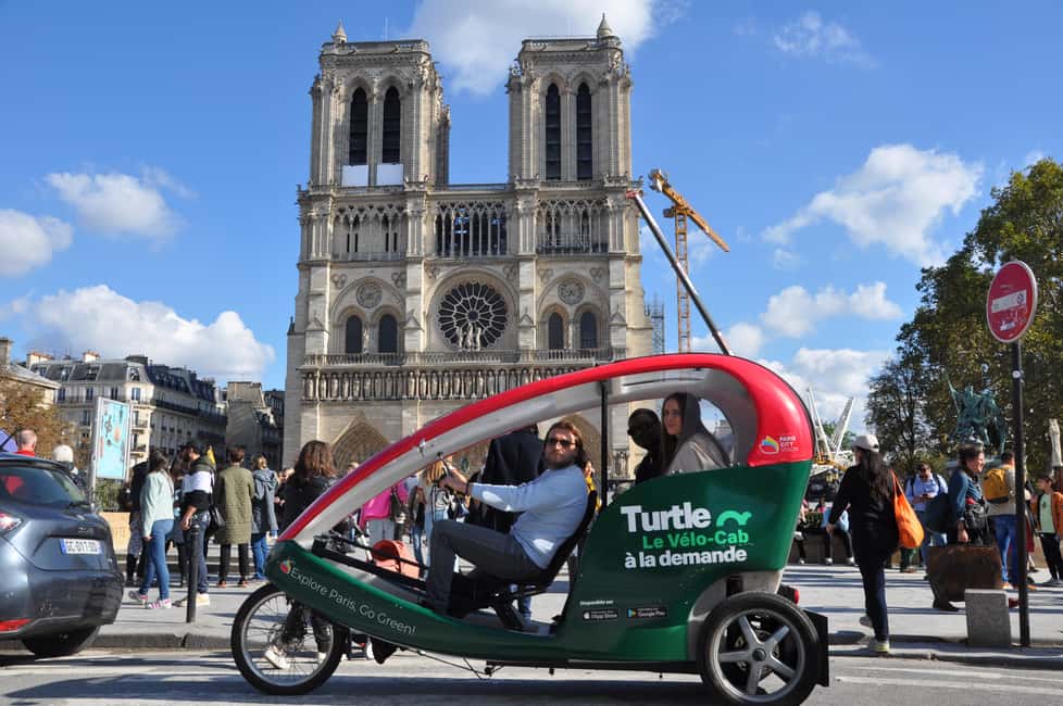 imagem n.1 de O melhor de Paris em tour particular de riquixá com guia de áudio atividade em Paris, carregada pelo fornecedor