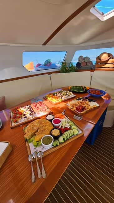 image n.6 of From Palma: Luxury Catamaran Group Tour with Tapas & Drinks activity in Balearic Islands, uploaded by supplier