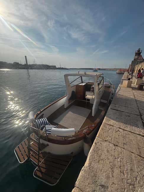 image n.8 of Wooden Gozzo Tour with Aperitif Towards the Beautiful Coast of Polignano activity in Polignano a Mare, uploaded by supplier