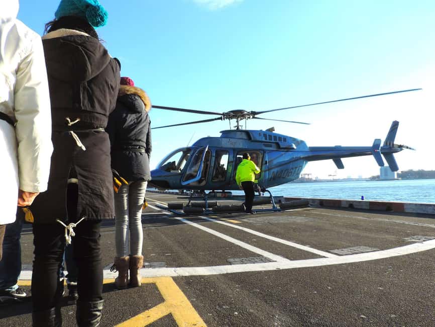 billede nr.6 af aktiviteten New York Citys skyline om aftenen fra helikopter i East Rutherford, uploadet af udbyder