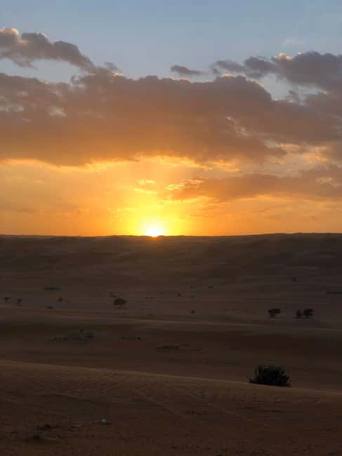 Immagine nº 4 di Muscat: giro in cammello al tramonto nel deserto di Bidiya con trasferimento attività a Regione al-Sharqiyya, caricata dal fornitore