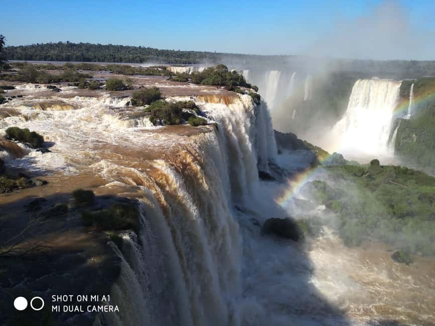 imagem n.1 de Foz do Iguaçu: Excursão de um dia às Cataratas do Iguaçu do lado do Brasil/Argentina atividade em Puerto Iguazú, carregada pelo fornecedor