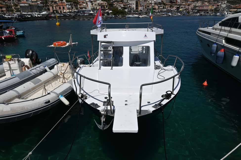 image n.8 of Catania: Boat Tour and Snorkeling with Aperitif and Prosecco activity in Acireale, uploaded by supplier