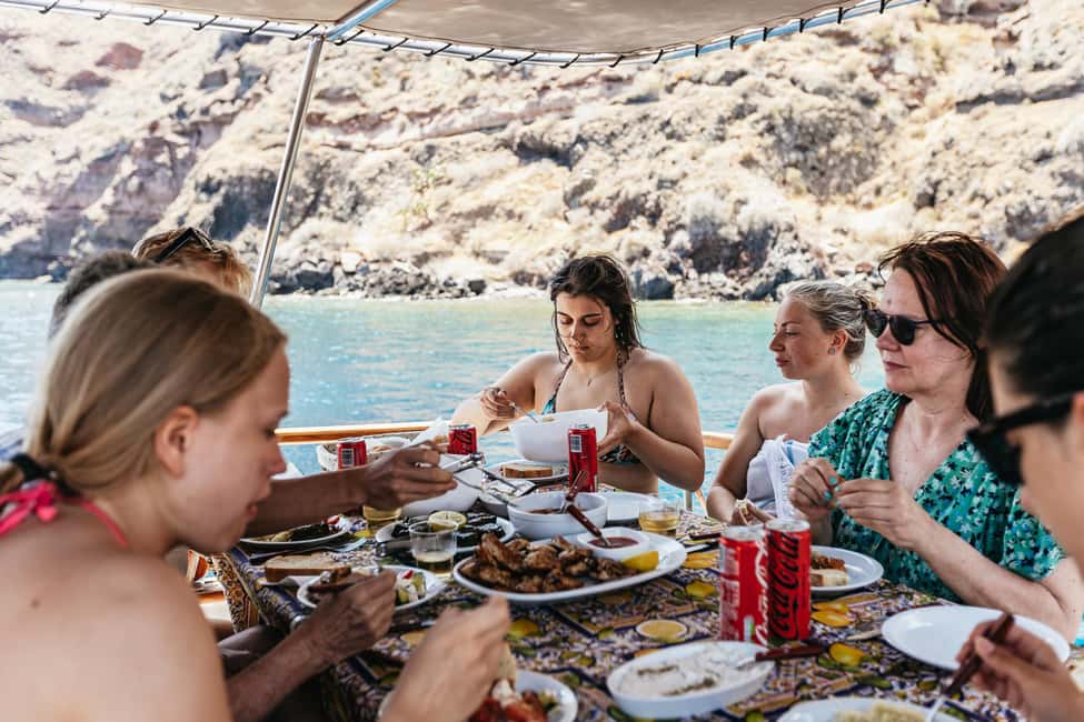 image n.11 of Santorini: Traditional Wooden Boat Tour with Meal and Wine activity in Cyclades, uploaded by supplier