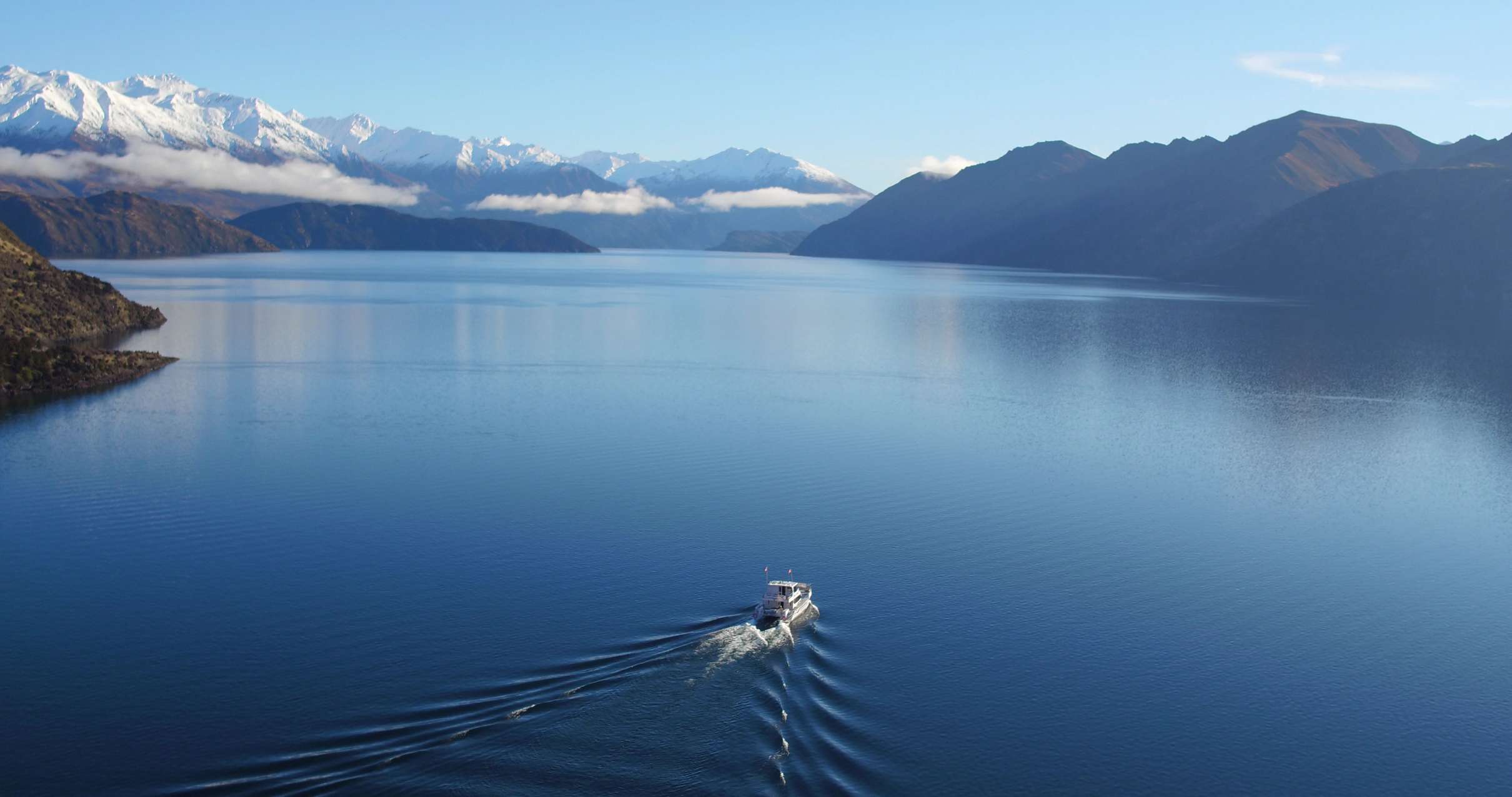 Catamaran cruise on Lake Wanaka with a landing on Stevensons Island in New Zealand