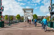 Amsterdam Bike Tour in Small Group + Optional Canal Cruise