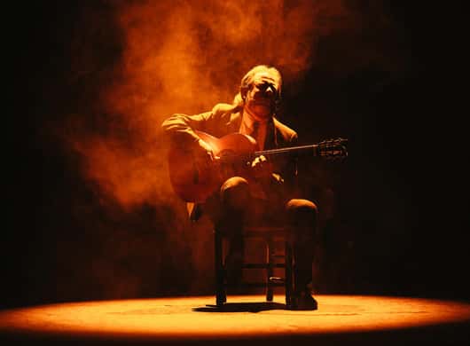 Flamencogitarist en danseres in Sevilla