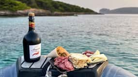 Alghero: boat tour with aperitif at sunset in Porto Conte