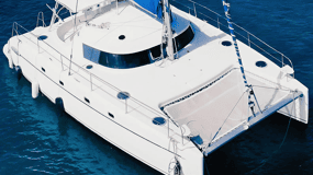 Modern Private Catamaran excursion + drinks Lunch and Music.