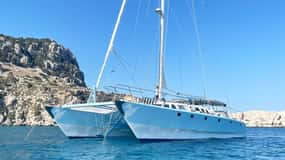 From Rhodes: Half-Day Catamaran Cruise with Swim Stops