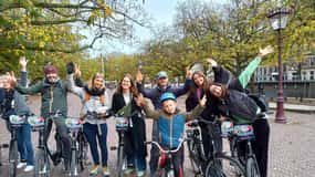 Amesterdão: Visita guiada de bicicleta em francês fora dos circuitos habituais