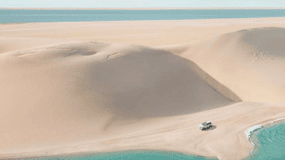 Experience Sand & Beach With DuneBashing, Sandboard & Pickup
