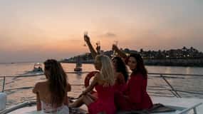 Dubai: Solnedgang og nattcruise med snacks og drikke