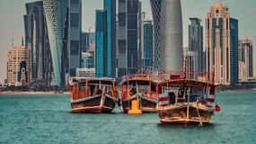 Doha: traditional Dhow Harbour, Skyline view , Sunset