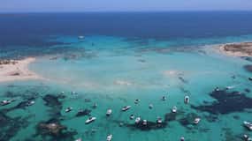 Ibiza: Boat trip to Formentera with sports, lunch, and open bar