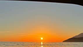 Sunset boat tour with swim stops,snorkeling&local wine