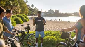 Hisnande cykel- och guidad kryssning i solnedgången på Manly Beach