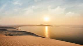 Doha:Tour Safari nel deserto all'alba o al tramonto con Sand Boarding