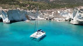 Milos: Full-Day Catamaran Cruise with Paddle Board