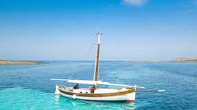 Da Stintino: Tour dell'Asinara in barca a vela d'epoca con pranzo